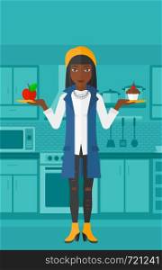 An african-american woman standing in kitchen with apple and cake in hands symbolizing choice between healthy and unhealthy food vector flat design illustration. Vertical layout.. Woman with apple and cake.