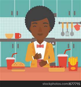 An african-american woman standing in the kitchen in front of table full of junk food and suffering from heartburn vector flat design illustration. Square layout.. Woman suffering from heartburn.