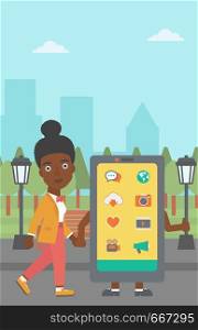 An african-american woman walking with a big smartphone in the park vector flat design illustration. Vertical layout.. Woman walking with smartphone.