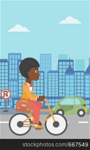 An african-american woman with a briefcase cycling to work on city background vector flat design illustration. Vertical layout.. Woman cycling to work.