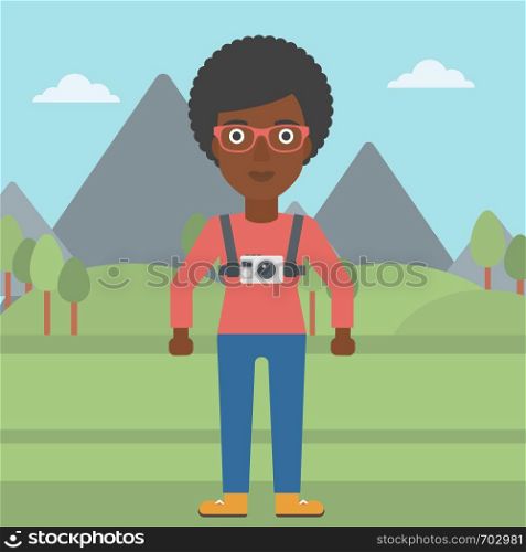 An african-american woman with a digital camera on her chest. Tourist with a digital camera standing on the background of mountains. Vector flat design illustration. Square layout.. Woman with camera on chest vector illustration.