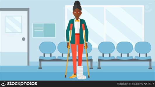 An african-american woman with broken leg standing with crutches on the background of hospital corridor vector flat design illustration. Horizontal layout.. Patient with broken leg.