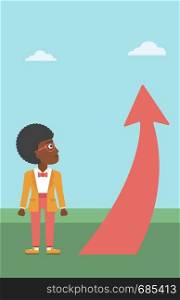 An african-american young business woman looking at a red arrow going up. Successful business concept. Vector flat design illustration. Vertical layout.. Business woman looking at arrow going up.