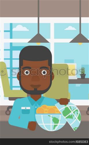An african-american young businessman sitting at the table in office with a Earth globe full of gold coins. Concept of global business. Vector flat design illustration. Vertical layout.. Businessman with Earth globe full of money.