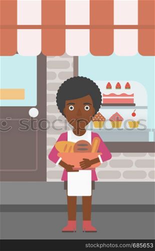 An african-american young female baker holding basket with bakery products. Female baker standing in front of bakery. Baker with bowl full of bread. Vector flat design illustration. Vertical layout.. Baker holding basket with bakery products.