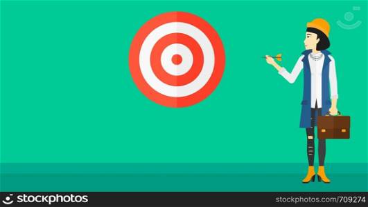 An asian business woman standing with arrow in hand and aiming at a target board on a green background vector flat design illustration. Horizontal layout.. Business woman with target board.