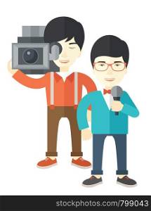 An asian cameraman filming a reporter vector flat design illustration isolated on white background. Vertical layout.. TV report.