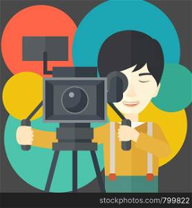 An asian cameraman looking through movie camera on a tripod vector flat design illustration. Square layout.. Cameraman.