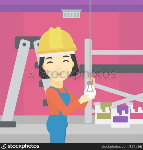 An asian female electrician twisting a light bulb. An electrician installing light in an apartment. Electrician changing light bulb. Vector flat design illustration. Square layout.. Electrician twisting light bulb.