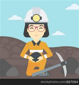 An asian female miner in hard hat sitting with coal in hands and a pickaxe on the background of coal mine. Vector flat design illustration. Square layout.. Miner holding coal in hands vector illustration.