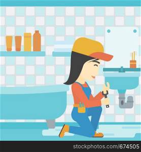 An asian female plumber sitting in a bathroom and repairing sink pipe. Plumber with wrench repairing a broken sink in bathroom. Vector flat design illustration. Square layout.. Woman repairing sink.