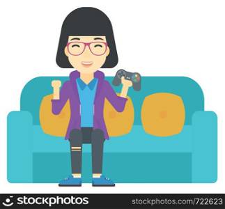 An asian happy woman sitting on a sofa with gamepad in hands vector flat design illustration isolated on white background.. Woman playing video game.