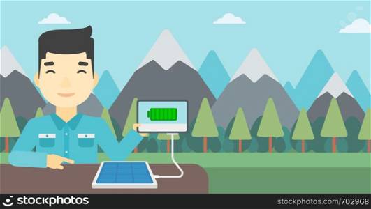 An asian man charging tablet computer with solar panel on the background of mountains. Charging digital tablet from portable solar panel. Vector flat design illustration. Horizontal layout.. Solar panel charging tablet computer.