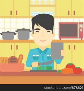 An asian man cutting vegetables for salad. Man following recipe for salad on digital tablet. Man cooking vegetable salad in the kitchen. Vector flat design illustration. Square layout.. Man cooking healthy vegetable salad.