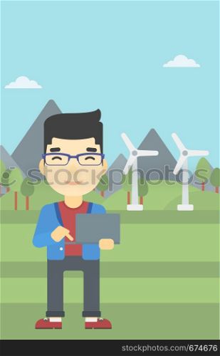 An asian man holding a laptop hands on a background with solar pannels and wind turbins. Man working on computer. Vector flat design illustration. Vertical layout.. Man working on laptop vector illustration.
