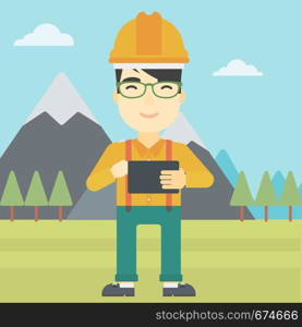 An asian man in hardhat holding a tablet computer in hands on the background of mountain landscape. Man working on digital tablet. Vector flat design illustration. Square layout.. Man holding tablet computer vector illustration.