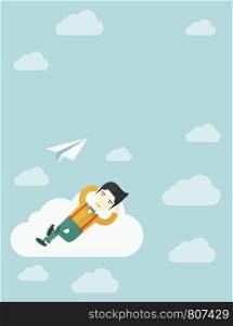 An asian man is relaxing while lying on a cloud with paper plane. A contemporary style with pastel palette soft blue tinted background with desaturated clouds. Vector flat design illustration. Vertical layout.. Asian man lying on a cloud with paper plane.
