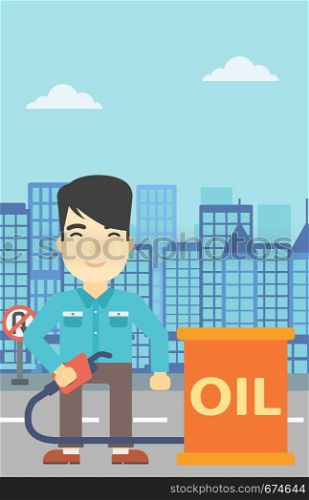 An asian man standing near oil barrel. Man holding gas pump nozzle on a city background. Man with gas pump and oil barrel. Vector flat design illustration. Vertical layout.. Man with oil barrel and gas pump nozzle.