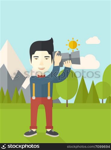 An asian photographer taking photo in mountains vector flat design illustration. Vertical layout with a text space.. Photographer.