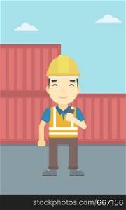 An asian port worker talking on wireless radio. Port worker standing on cargo containers background. Man using wireless radio. Vector flat design illustration. Vertical layout.. Port worker talking on wireless radio.