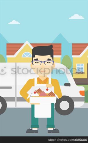 An asian smiling baker holding a box of cakes. Baker delivering cakes. A baker with cupcakes standing on the background of delivery truck. Vector flat design illustration. Vertical layout.. Baker delivering cakes vector illustration.