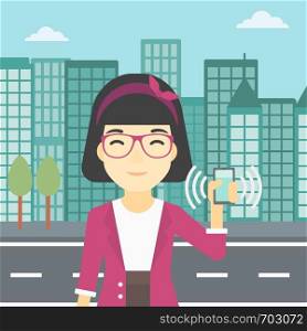 An asian woman holding ringing mobile phone on a city background. Woman answering a phone call. Woman with ringing phone in hand. Vector flat design illustration. Square layout.. Woman holding ringing telephone.