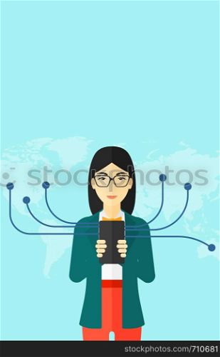 An asian woman holding smartphone connected with the whole world on a blue background vector flat design illustration. Vertical layout.. Woman using smartphone.