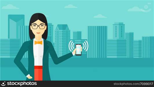 An asian woman holding vibrating smartphone on a city background vector flat design illustration. Horizontal layout.. Woman holding ringing telephone.