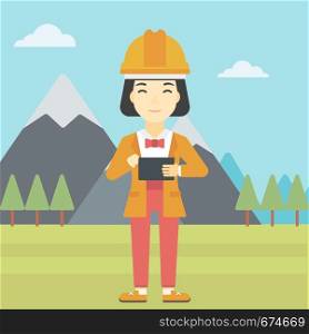 An asian woman in hardhat holding a tablet computer in hands on the background of mountain landscape. Woman working on digital tablet. Vector flat design illustration. Square layout.. Woman holding tablet computer vector illustration.
