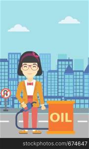 An asian woman standing near oil barrel. Woman holding gas pump nozzle on a city background. Woman with gas pump and oil barrel. Vector flat design illustration. Vertical layout.. Woman with oil barrel and gas pump nozzle.