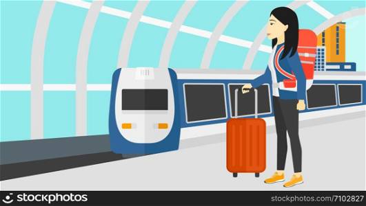 An asian woman standing with suitcase on wheels and holding a briefcase in hand on the background of modern train arriving at the station vector flat design illustration. Horizontal layout.. Woman with suitcase on wheels and briefcase.