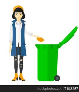 An asian woman throwing a trash into a green bin vector flat design illustration isolated on white background. . Woman throwing trash.