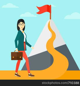 An asian woman with a suitcase in hand standing on a road leading to the top of the mountain with a flag on the background of blue sky vector flat design illustration. Square layout.. Cheerful leader woman.