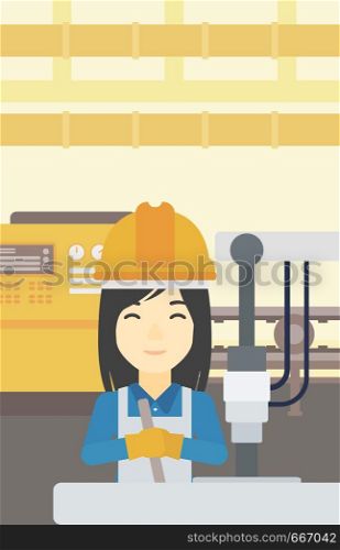 An asian woman working on industrial drilling machine. Woman using drilling machine at manufactory. Metalworker drilling at workplace. Vector flat design illustration. Vertical layout.. Woman working on industrial drilling machine.