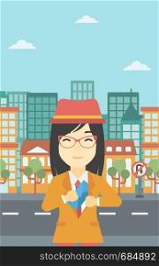 An asian young business woman putting an envelope in her pocket on a city background. Vector flat design illustration. Vertical layout.. Woman putting envelope in pocket.