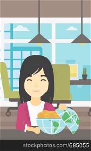 An asian young business woman sitting at the table in office with a Earth globe full of gold coins. Concept of global business. Vector flat design illustration. Vertical layout.. Business woman with Earth globe full of money.