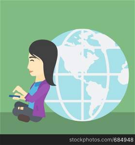 An asian young business woman sitting near big Earth globe and holding a smartphone in hands. Concept of global business. Vector flat design illustration. Square layout.. Businessman sitting near Earth globe.