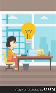 An asian young business woman working on her laptop in office and a big idea bulb above the table. Successful business idea concept. Vector flat design illustration. Vertical layout.. Successful business idea vector illustration.