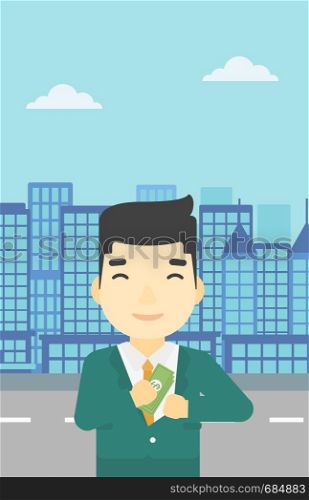An asian young businessman putting money in his pocket on a city background. Vector flat design illustration. Vertical layout.. Man putting money in pocket vector illustration.