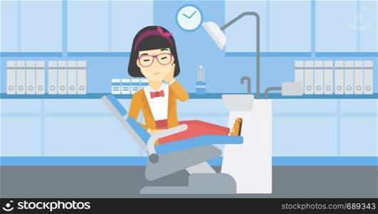 An asian young female patient sitting in dental chair at dentist office. Sad woman suffering from tooth pain. Woman having a toothache. Vector flat design illustration. Horizontal layout.. Woman suffering in dental chair.