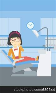 An asian young female patient sitting in dental chair at dentist office. Sad woman suffering from tooth pain. Woman having a toothache. Vector flat design illustration. Vertical layout.. Woman suffering in dental chair.