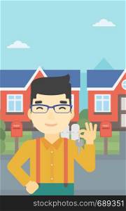 An asian young male real estate agent holding key. Man with keys standing in front of the house. Happy new owner of a house. Vector flat design illustration. Vertical layout.. Real estate agent with key vector illustration.
