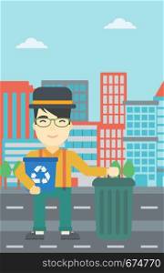 An asian young man carrying recycling bin. Man with recycling bin standing near a trash can on a city background. Vector flat design illustration. Vertical layout.. Man with recycle bin and trash can.