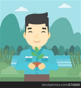 An asian young man holding in hands a small plant in soil on the background of landscape with mountains and river. Vector flat design illustration. Square layout.. Man holding plant vector illustration.