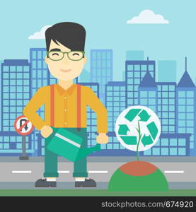 An asian young man watering a tree with a recycle sign instead of crown on a city backround. Eco-friendly man takes care of the environment. Vector flat design illustration. Square layout.. Man watering tree with recycle sign.