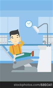 An asian young patient sitting in dental chair at dentist office. Sad man suffering from tooth pain. Man having a toothache. Vector flat design illustration. Vertical layout.. Man suffering in dental chair vector illustration.