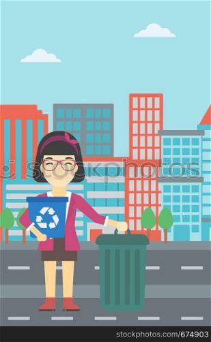 An asian young woman carrying recycling bin. Woman with recycling bin standing near a trash can on a city background. Vector flat design illustration. Vertical layout.. Woman with recycle bin and trash can.