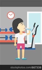 An asian young woman drinking water. Sportive woman with bottle of water in the gym. Young sports woman drinking water from the bottle. Vector flat design illustration. Vertical layout.. Sportive woman drinking water vector illustration.