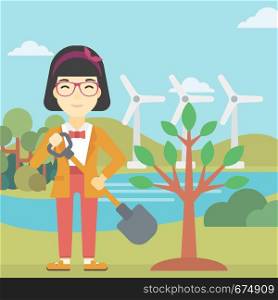 An asian young woman plants a tree. Woman standing with shovel near newly planted tree. Woman planting tree on a background of wind turbines. Vector flat design illustration. Square layout.. Woman plants tree vector illustration.