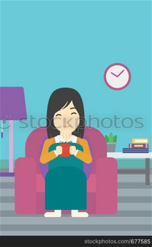 An asian young woman relaxing under blanket with cup of coffee. Woman drinking coffee at home. Woman holding a cup of hot flavored coffee or tea. Vector flat design illustration. Vertical layout.. Woman drinking coffee or tea vector illustration.